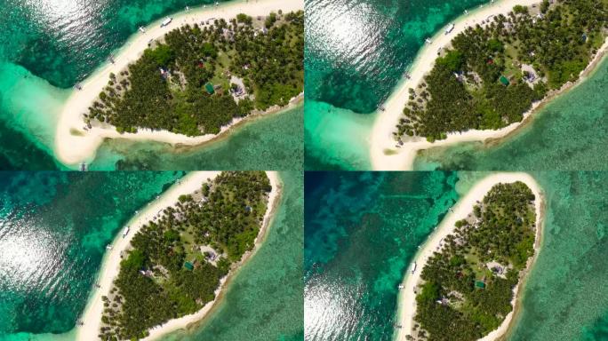 一个大环礁上的白沙岛，从上面可以看到。有棕榈树的热带岛屿。带天堂岛的海景