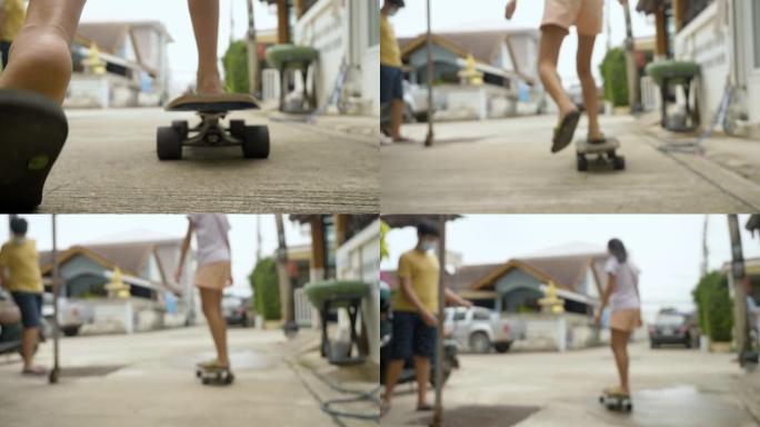 亚洲女孩玩滑板的乡村生活理念。