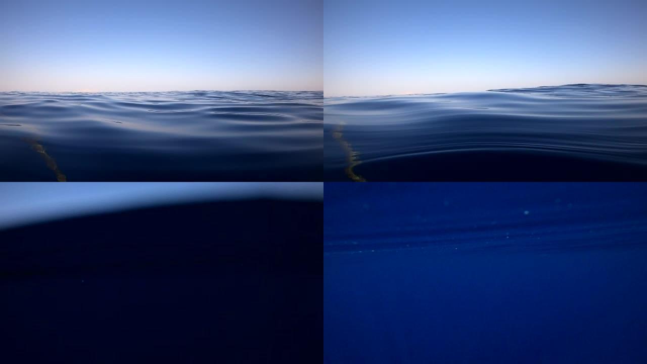 水下摄像机坠入水中，进入埃及的深处，红海。高清视频