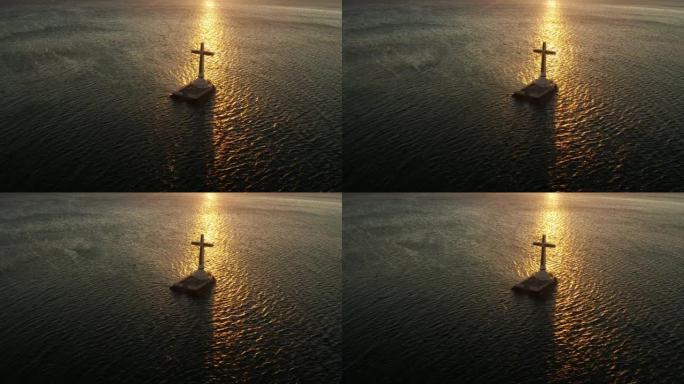 菲律宾卡米金岛沉没的墓地十字架