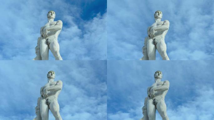 云和天空的运动员雕像