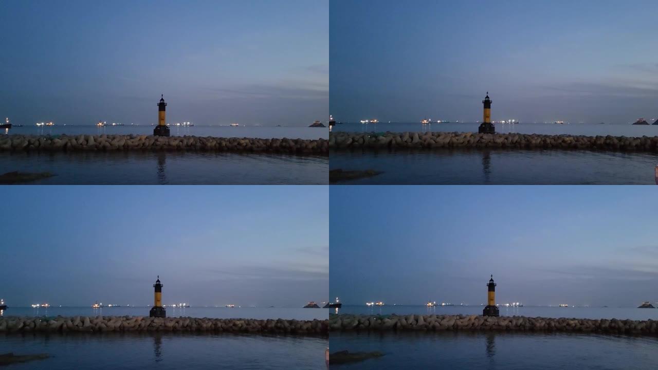 拍摄灯塔夜景和夜海