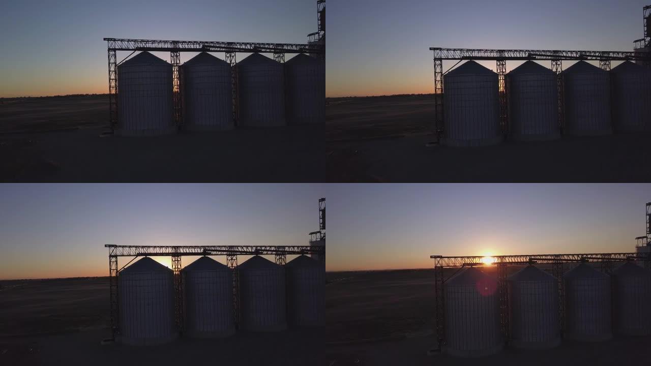 平原上谷物升降机的日落天线