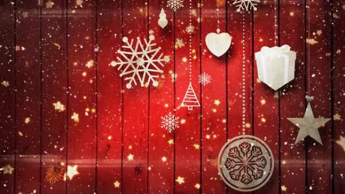 红色背景上的圣诞节装饰品上的雪的动画