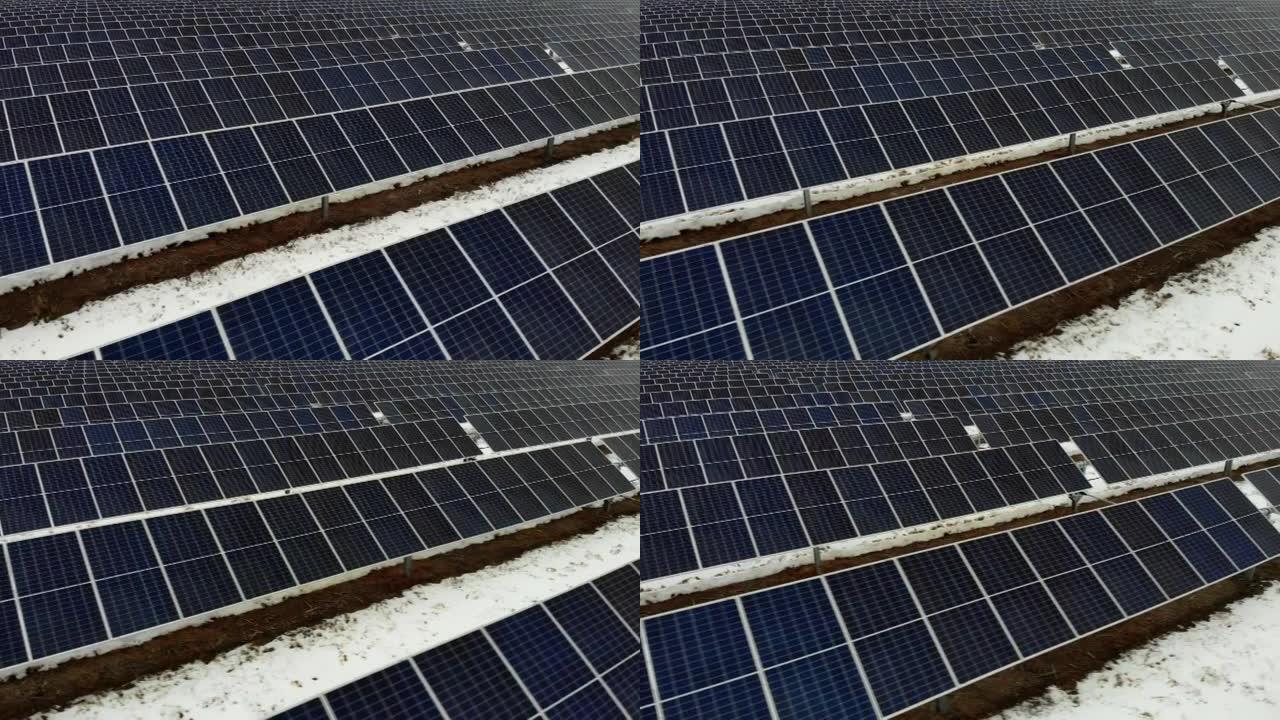 在阴天的冬天，数百个太阳能电池板连续出现。
