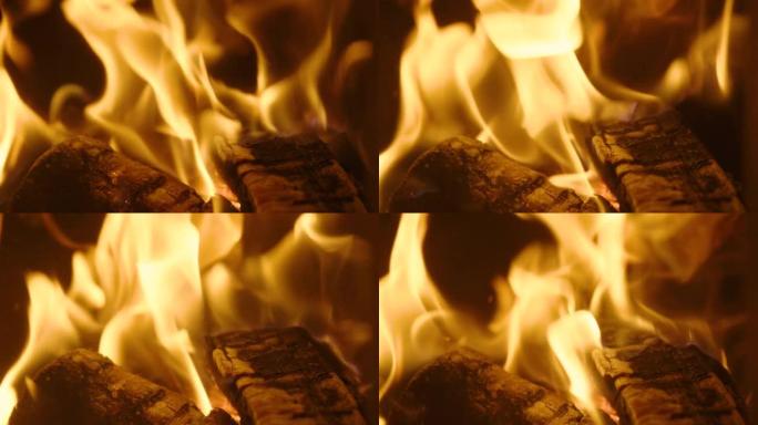原木以慢动作燃烧，60fps，在木头燃烧器的黑暗空间中