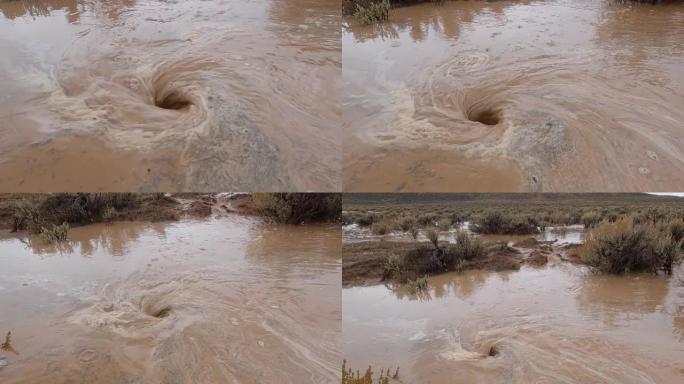 暴雨过后，漩涡将泥水吸入地下