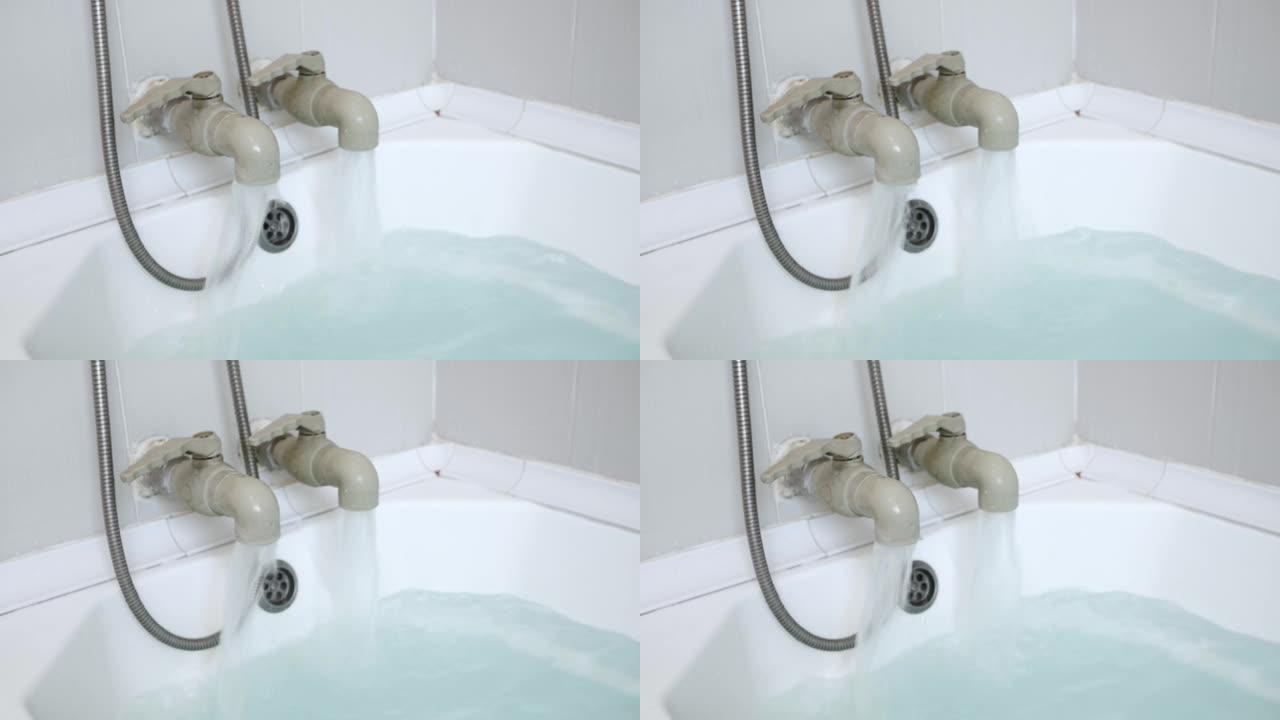 充满愈合矿物硫化氢水蓝的浴缸。水从浴缸中的水龙头流出