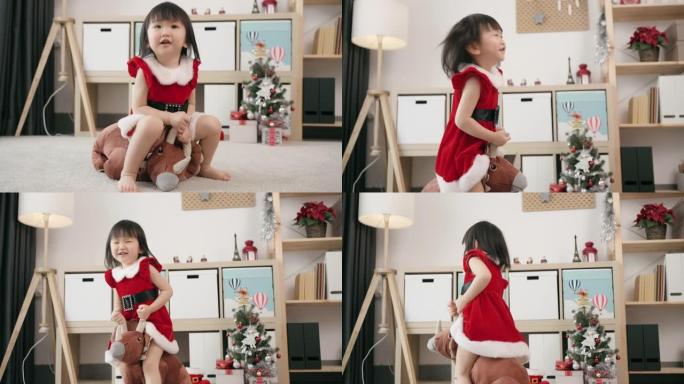 亚洲小女孩很高兴在圣诞节收到礼物。
