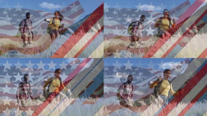 美国国旗的动画在微笑的多样化夫妇在山上徒步旅行