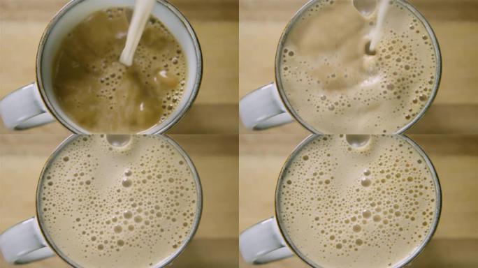平面图将泡沫燕麦牛奶添加到装有咖啡的杯子中，60fps