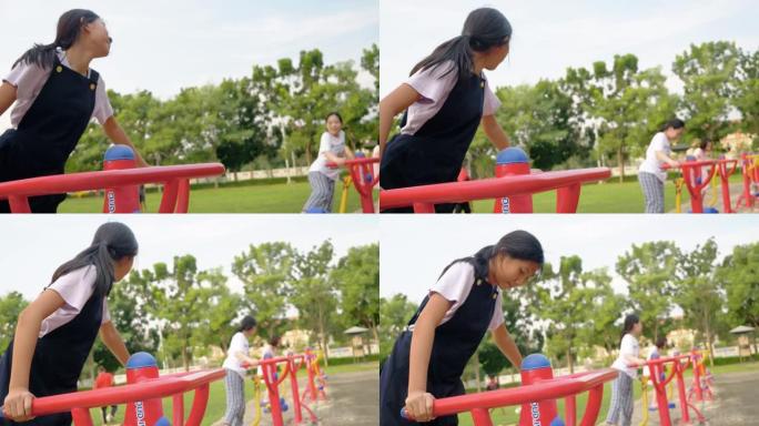 亚洲儿童与运动器材一起户外锻炼，生活方式理念。