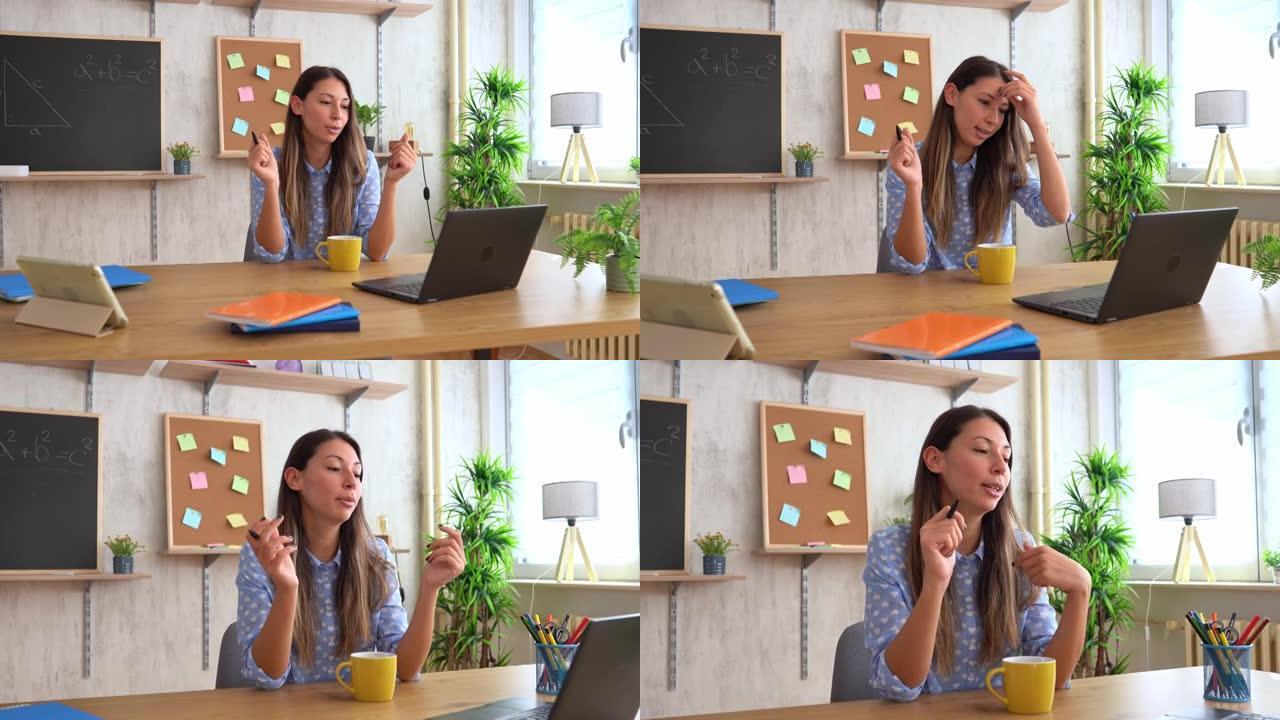 女数学老师在家用笔记本电脑在线授课