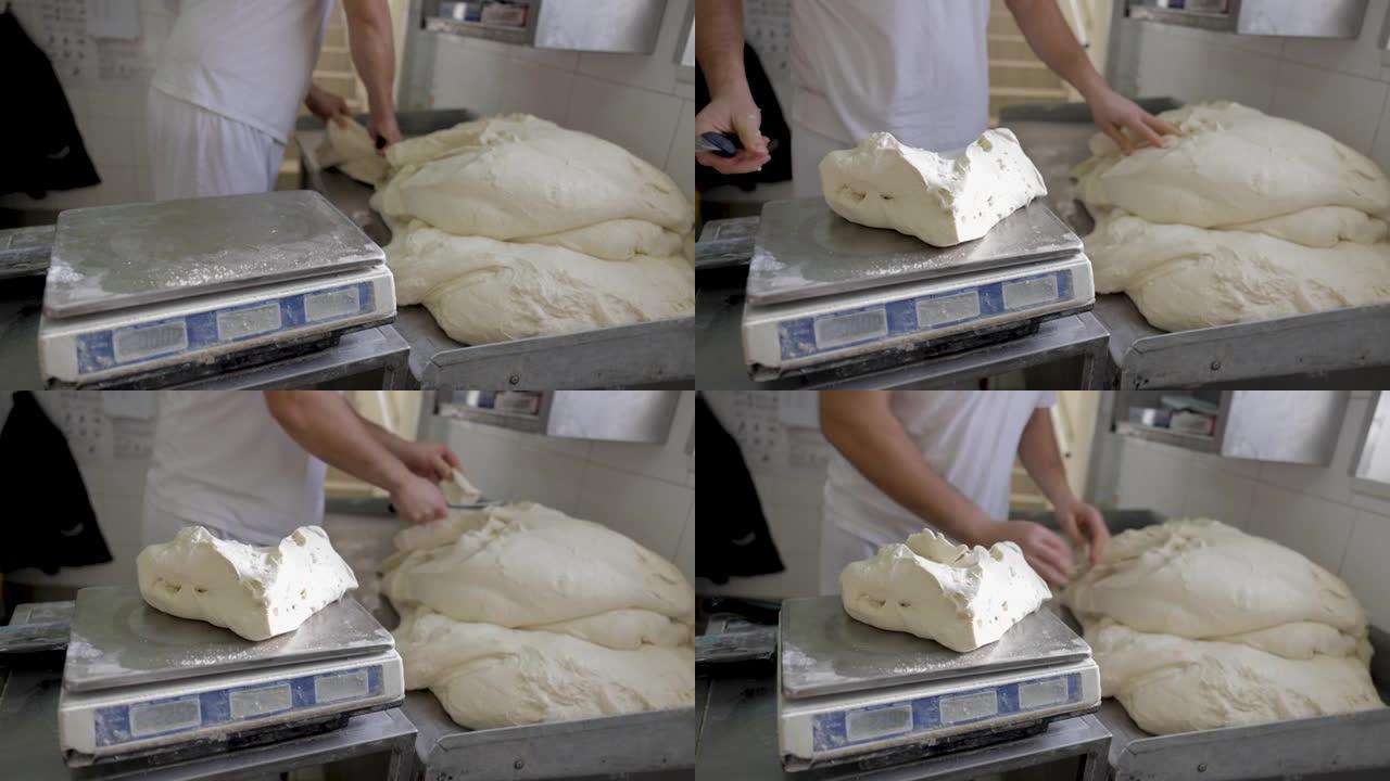 熟练的面包师，用体重秤测量面团