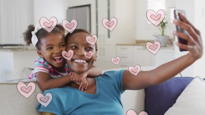快乐的美国黑人母亲和女儿在心形上自拍的动画