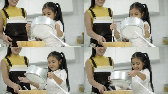 妈妈和女儿一起烘烤