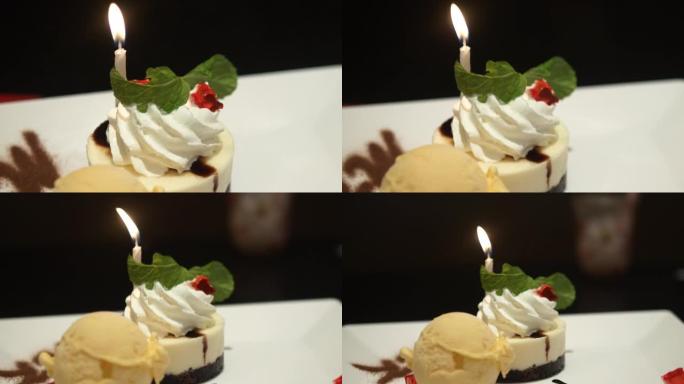 生日冰淇淋蛋糕，烛光放在盘子上，庆祝生日或节日的生活方式概念。