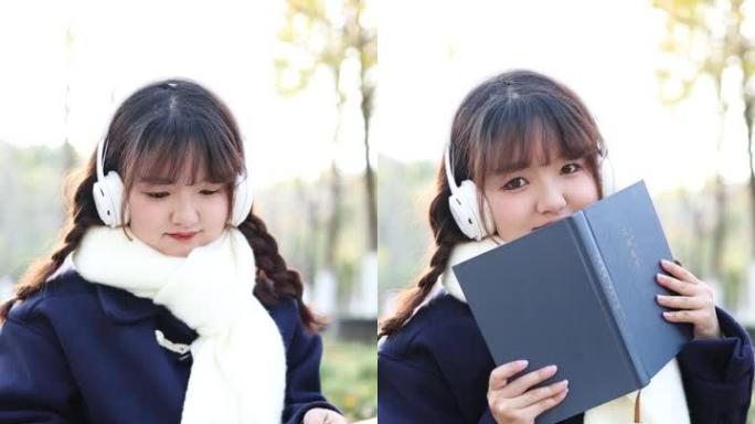 秋天，一个女人在外面听音乐和看书。