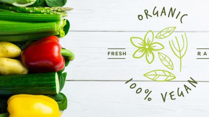 绿色的有机100% 纯素食文本的动画，在白板上的新鲜蔬菜上