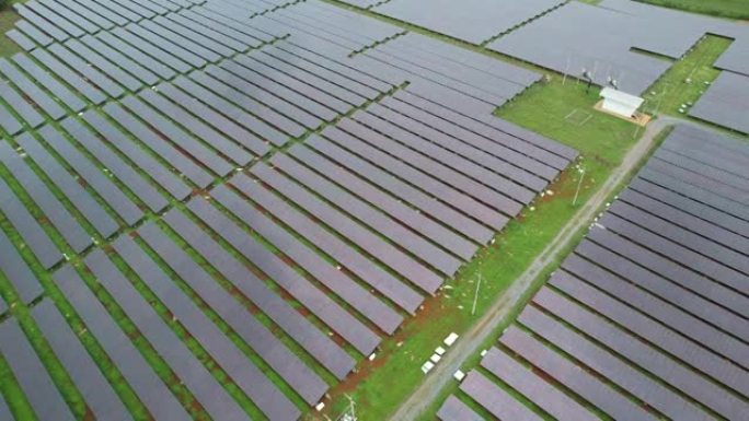 空中无人机飞行飞越太阳能电池板领域泰国可再生绿色替代能源概念