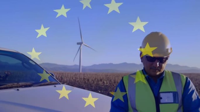在现场使用平板电脑和风力涡轮机对工程师的欧盟旗帜的动画