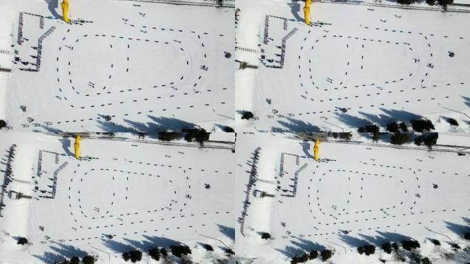 空中俯瞰冬季滑雪运动。滑雪者跑完马拉松全程。冬季运动比赛