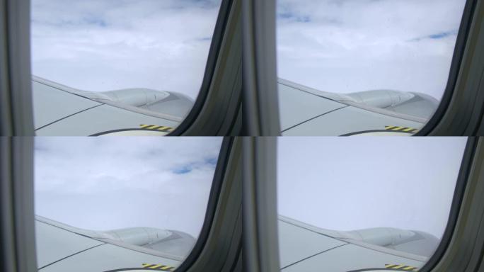 飞机进入云层，景色变得全白。