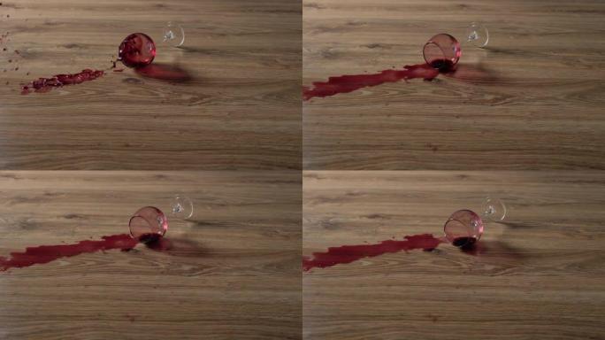 一杯红酒以慢动作落在层压板上