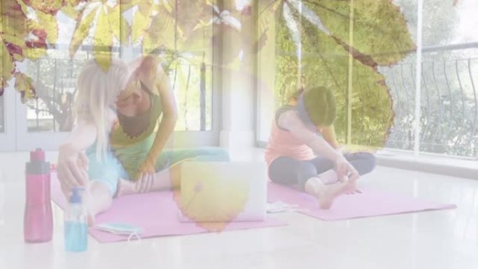 快乐的白人妇女和女儿做瑜伽的叶子动画