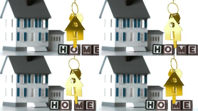 带文字房屋的木块动画和带钥匙的金色房屋形状