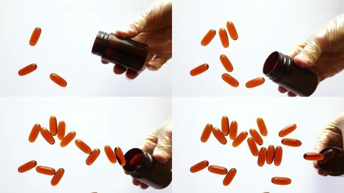 慢动作落下的药丸。白色背景上的药瓶。欧米茄胶囊，食品补充剂或维生素。选择性聚焦。