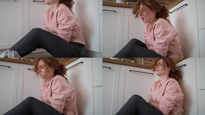 年轻白人妇女因饮食失调而胃痛的视频。用8k的红氦相机拍摄。
