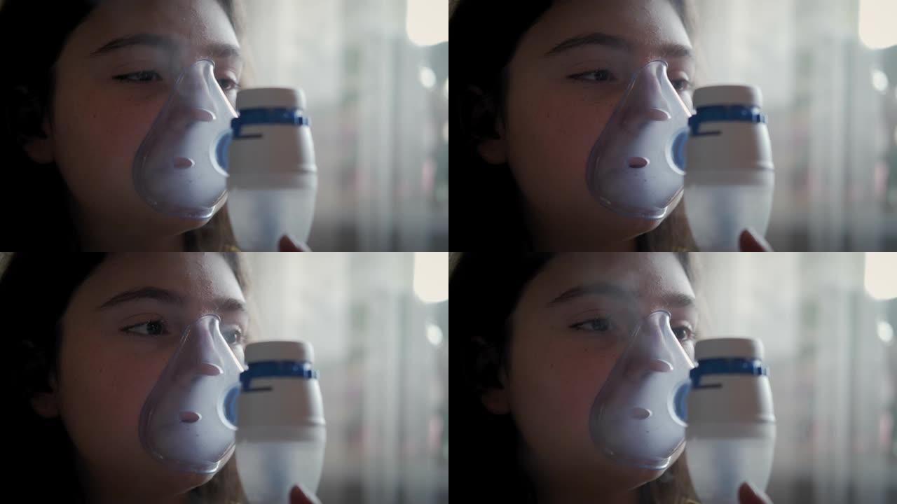 儿童哮喘吸入面罩疾病的特写镜头小女孩独立做气雾剂。