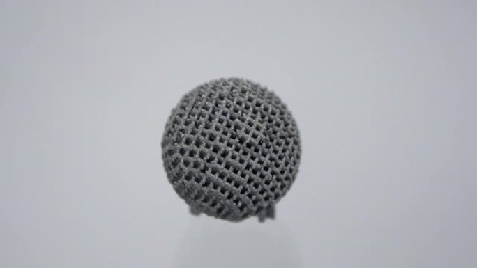 金属微距3D打印机上打印的模型。物体表面特写。在金属3D打印机上创建的布局。新的现代渐进添加剂3D打