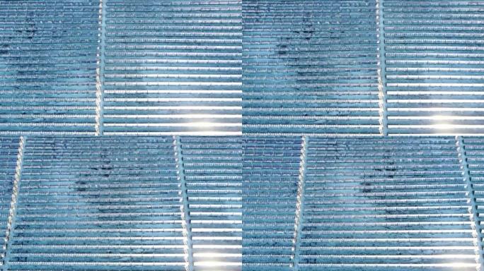 从无人机上看到的冰冻冬季太阳能电池板