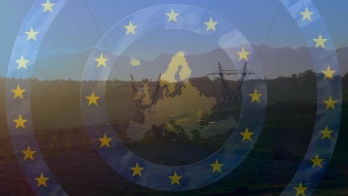 来自欧盟国旗的星星的动画和野外电力塔架上的地图