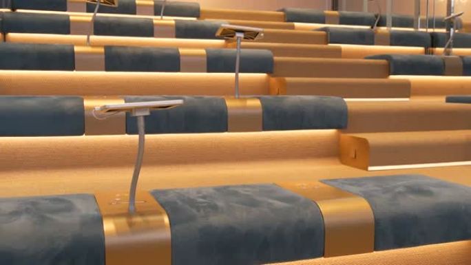 现代室内空会议厅蓝色座位整齐排椅空位观众礼堂听众商务公共活动正式会议无人教育讲座研讨会房间出租