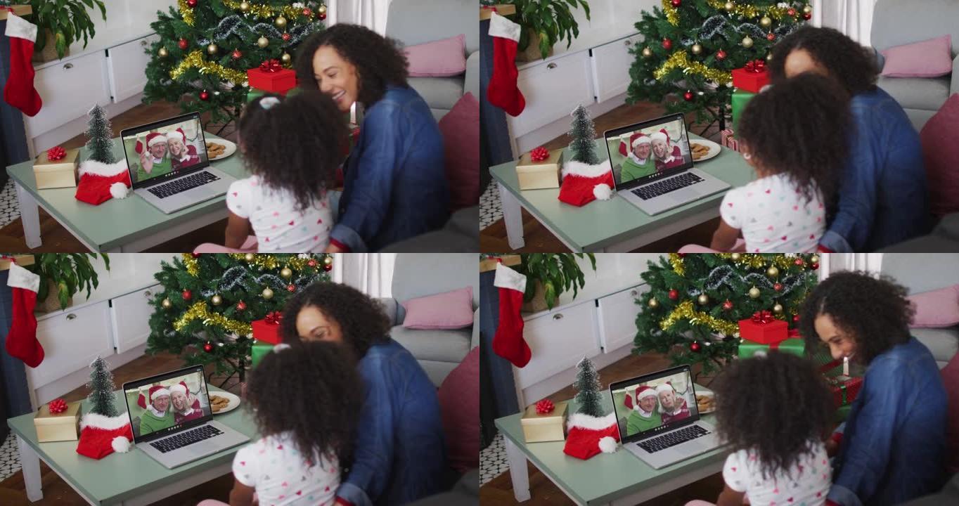 非裔美国母女在圣诞节与高级夫妇进行视频通话