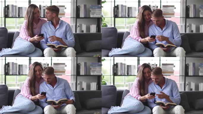 千禧一代高加索人可爱的已婚情人夫妇坐在客厅舒适的沙发上拥抱在一起聊天，丈夫看书，可爱的妻子微笑着向他