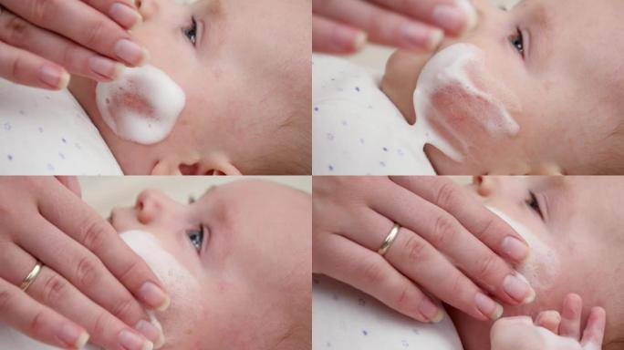 母亲使用医用软膏治疗婴儿皮炎和痤疮的特写镜头。新生婴儿卫生、健康和皮肤护理的概念