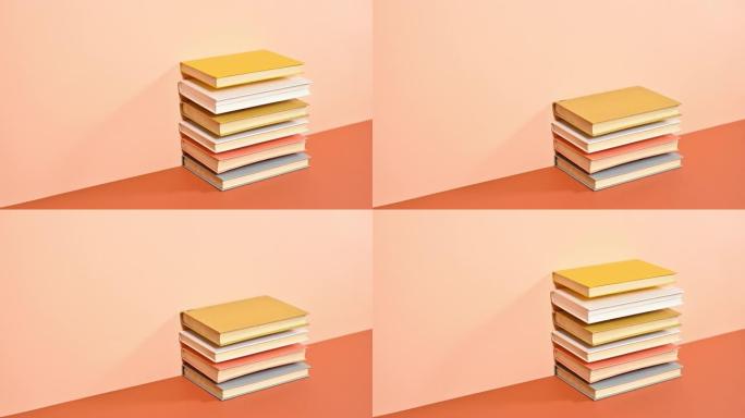 一堆精装书在深橙色主题上一对一订购。停止运动