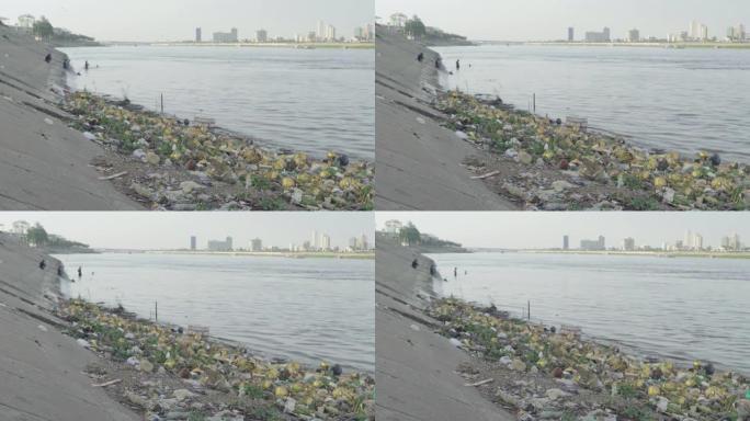 湄公河河岸上的垃圾。柬埔寨