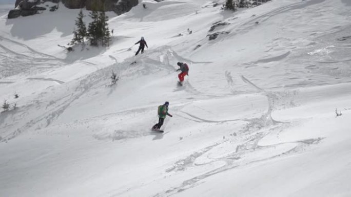 自由滑雪者在越野滑雪中滑雪，从山顶下坡，冬季极限运动，慢动作