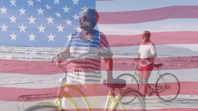 美国国旗的动画在快乐的资深非洲裔美国人夫妇在海滩上