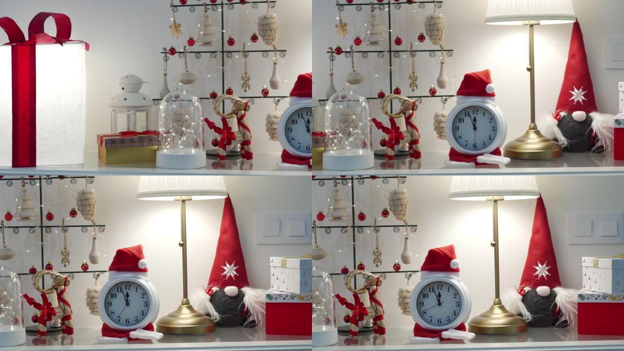 圣诞新年装饰背景，金属圣诞树挂木饰品，红色白金礼品盒，经典闹钟。假日季节。