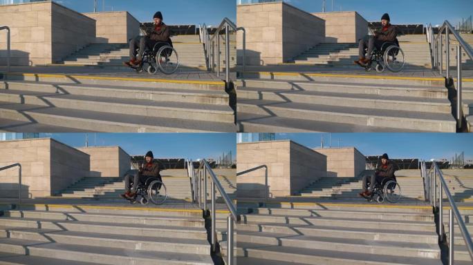 身体底部瘫痪的男子坐在城市的轮椅上，通过智能手机发送消息