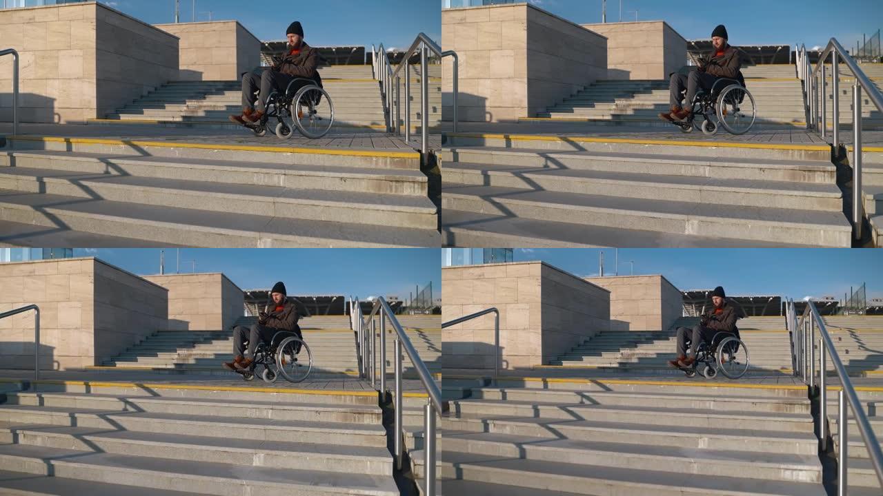 身体底部瘫痪的男子坐在城市的轮椅上，通过智能手机发送消息