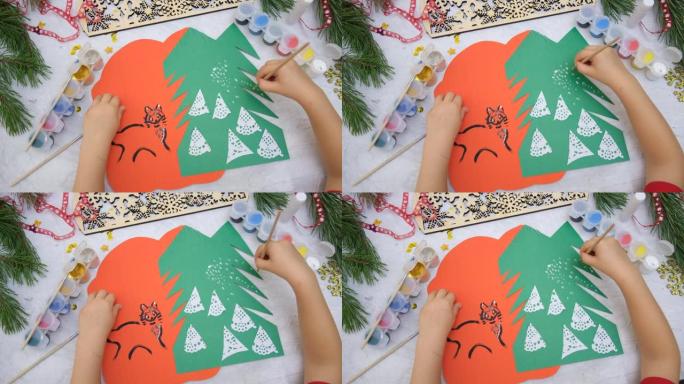 儿童为儿童制作贺卡工艺。带有圣诞雪林的漂亮贺卡。。顶级vie