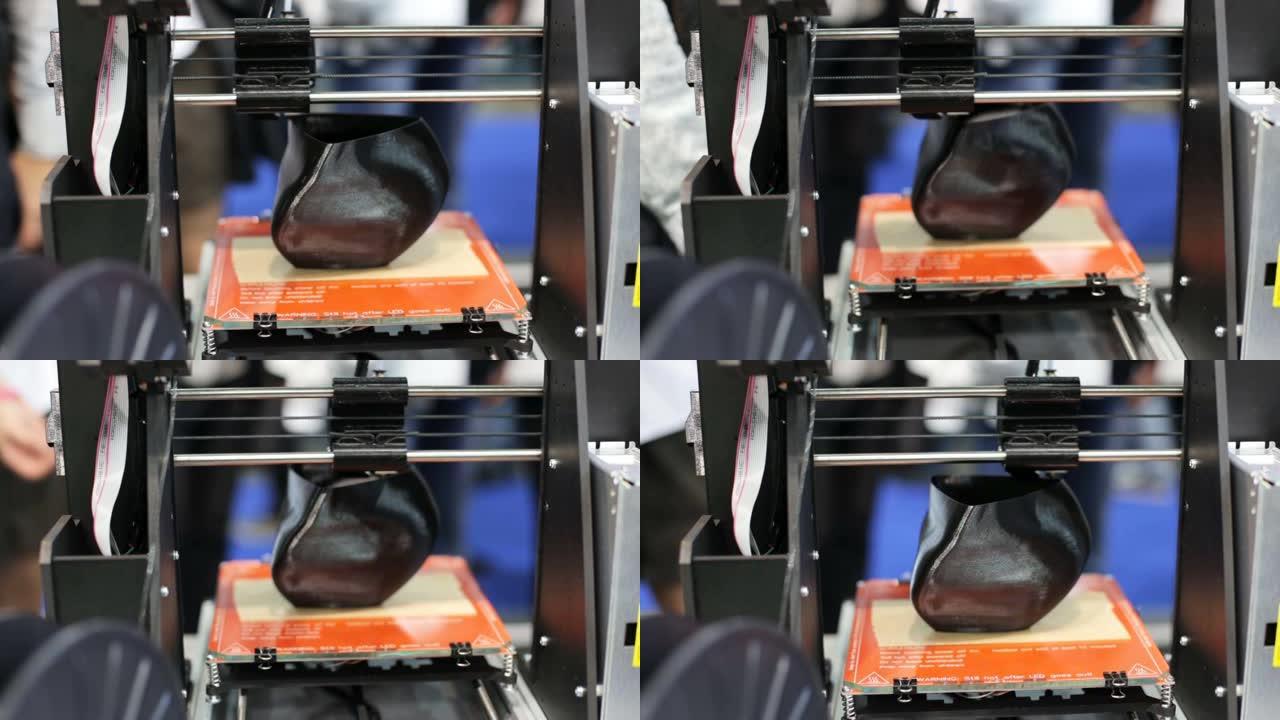 3D打印机用塑料打印物体。自动三维3d打印机执行塑料。用于3d打印的渐进添加剂技术。