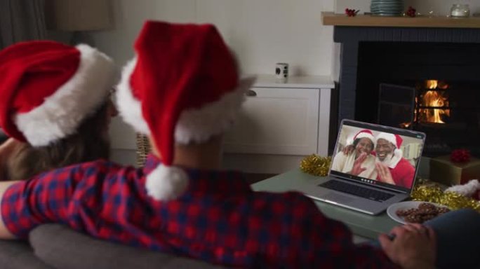 圣诞节期间，高加索夫妇与资深朋友进行视频通话